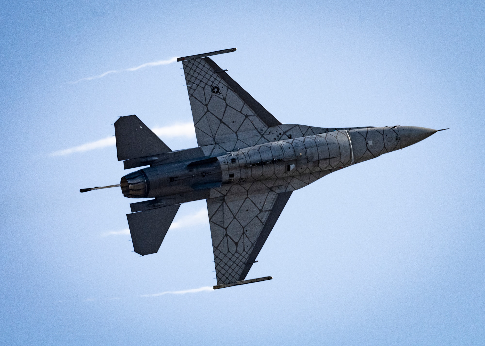 A pilot assigned to the F-16 Viper Demonstration Team performs a falcon turn during practice at Shaw Air Force Base, S.C., Jan. 26, 2022. The VDT plays a significant role in not only maintaining community relations for the Air Force, but also in recruiting future members of our service. (U.S. Air Force photo by Senior Airman Madeline Herzog)