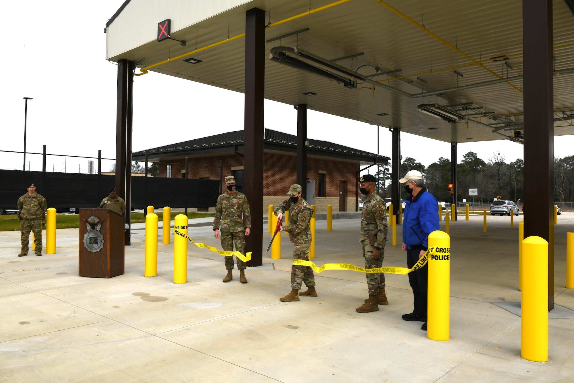 People cutting ribbon