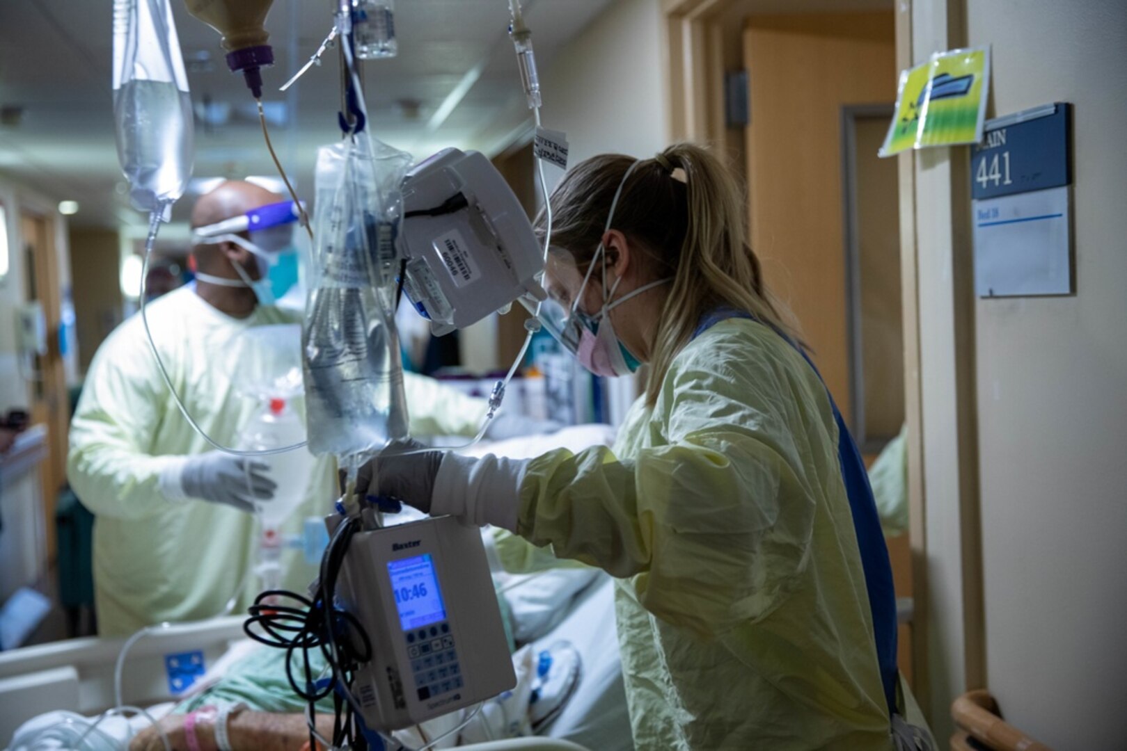 U.S. Army 1st Lt. Kristian Hill, a registered nurse assigned to 14th Field Hospital, transports a patient during the COVID response operations at Lifespan Community Health Institute in Providence, Rhode Island, Jan. 24, 2022. U.S. Northern Command, through U.S. Army North, remains committed to providing flexible Department of Defense support to the whole-of-government COVID response. (U.S. Army photo by Sgt. Kaden D. Pitt)