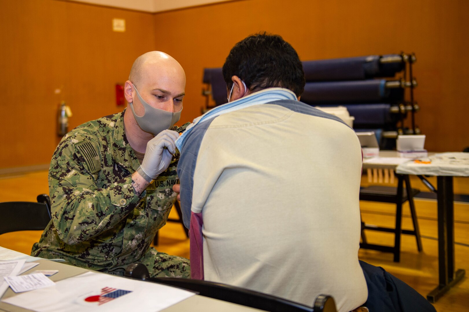 USS Ronald Reagan, U.S. Naval Hospital Yokosuka Sailors Administer COVID-19 Boosters to American, Japanese Base Employees