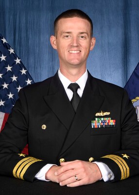 Commander Keith Tate