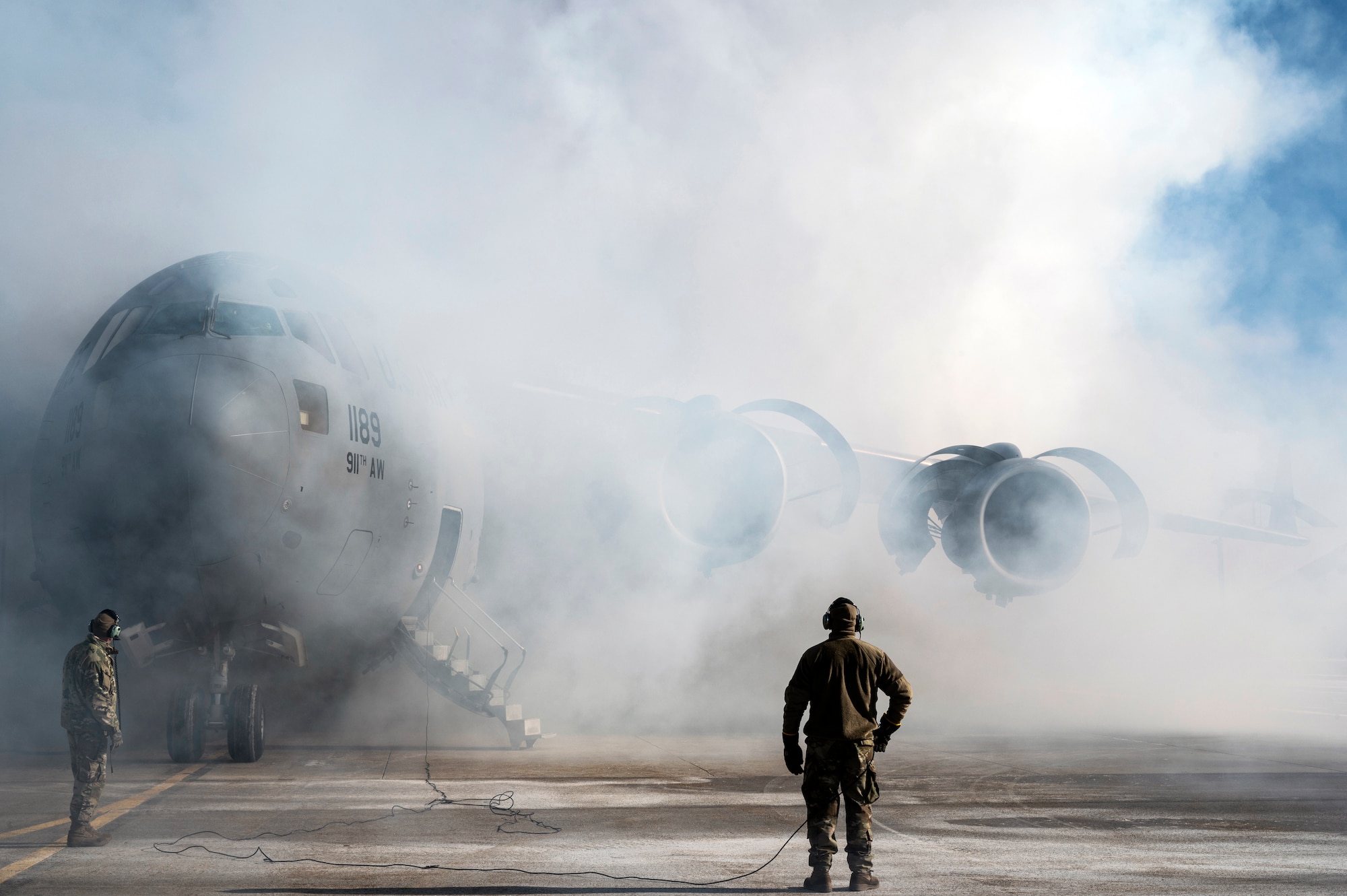 Airmen assigned to the 911th Maintenance Group conduct an engine depreservation run on a C-17 Globemaster III