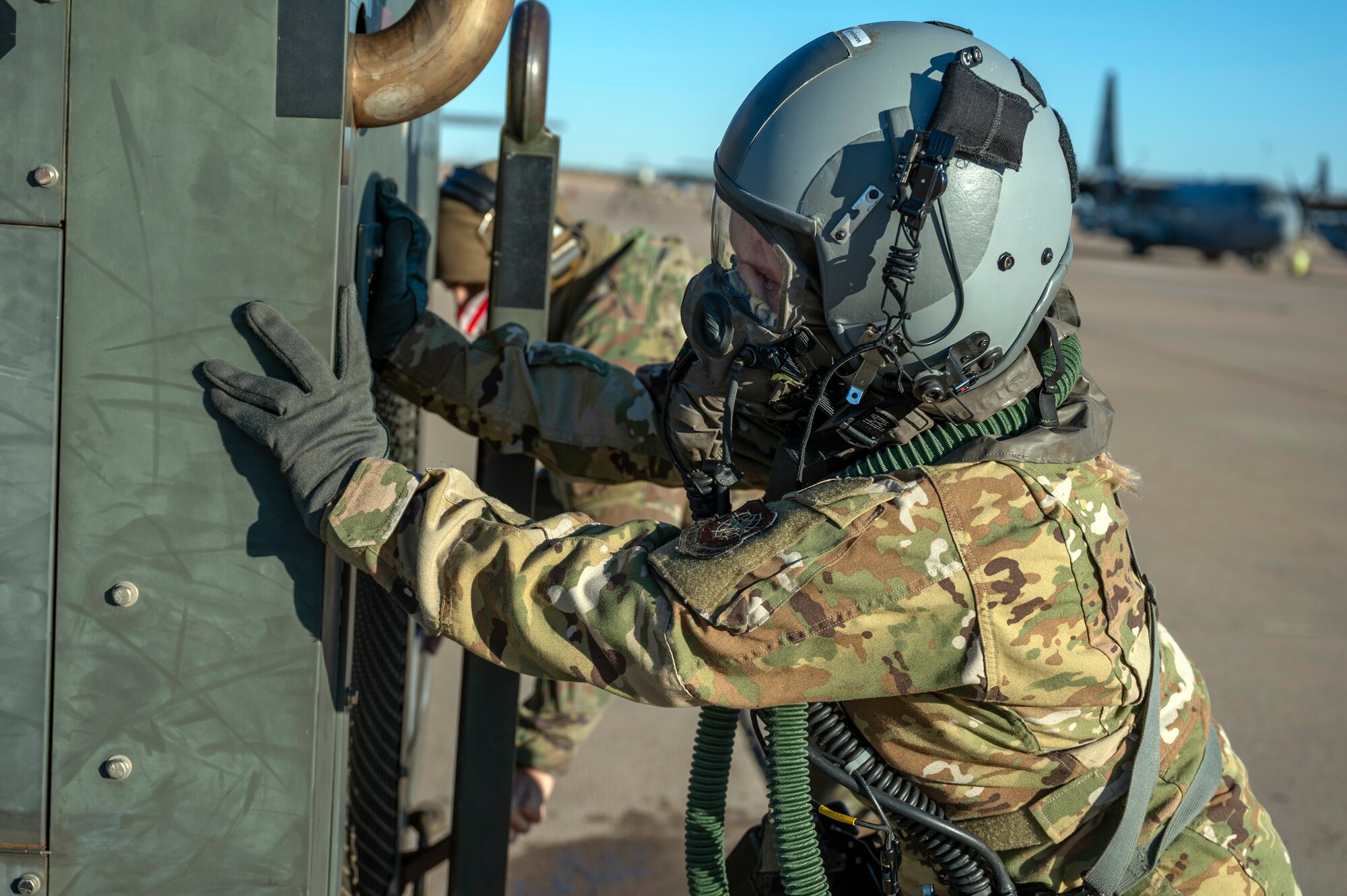 Staff Sgt. Gabrielle Wright, 40th Airlift Squadron loadmaster, performs preflight duties
