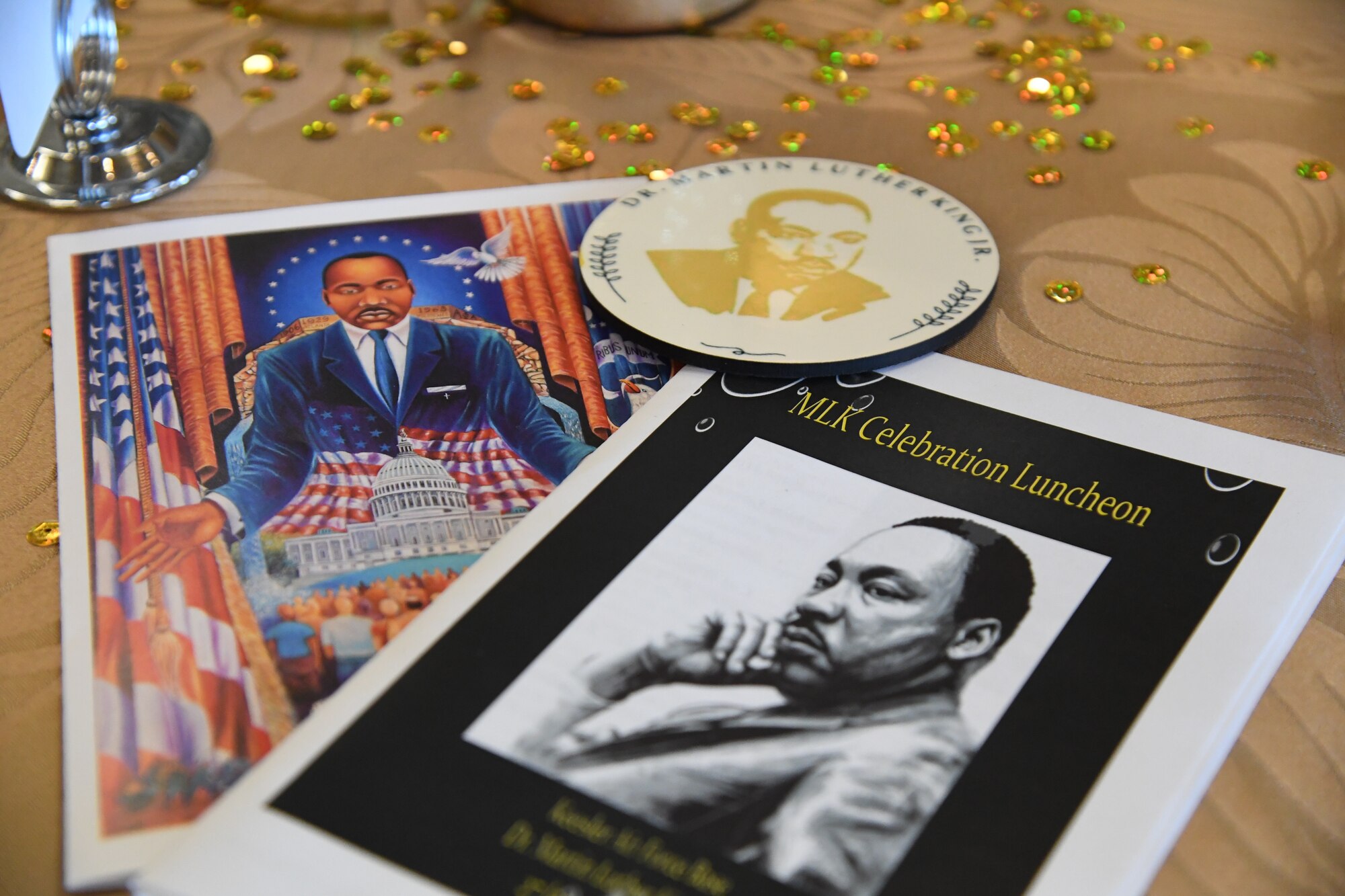 An event program is on display at the annual Dr. Martin Luther King Jr. Celebration Luncheon inside the Bay Breeze Event Center at Keesler Air Force Base, Mississippi, Jan. 27, 2022. The 81st Training Wing and the 81st Training Group hosted the event honoring King's legacy and his efforts to inspire civil rights activism within the African-American community. He is widely regarded as America's pre-eminent advocate of nonviolence and one of the greatest nonviolent leaders in world history. (U.S. Air Force photo by Kemberly Groue)