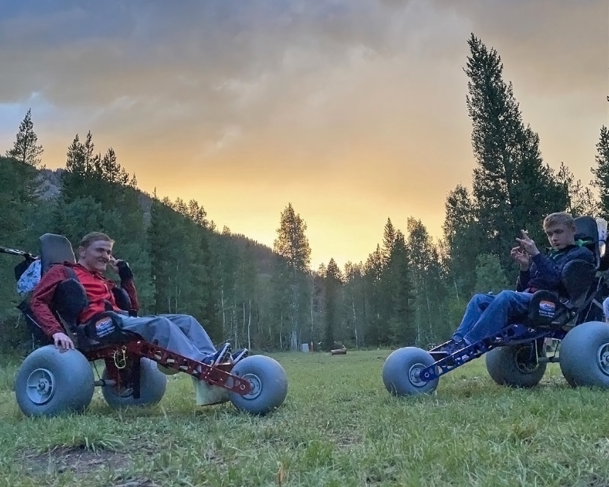 Dino and Tyson Graham, sons of Master Sgt. Jared Graham, 75th Logistics Readiness Squadron, and wife Laura, pose in their new all-terrain wheelchairs during a hike. The Grahams’ received a special needs grant offered by the Air Force Aid Society to purchase the “adventurous wheels” for their sons, enabling them to enjoy the outdoors more. (Courtesy photo)