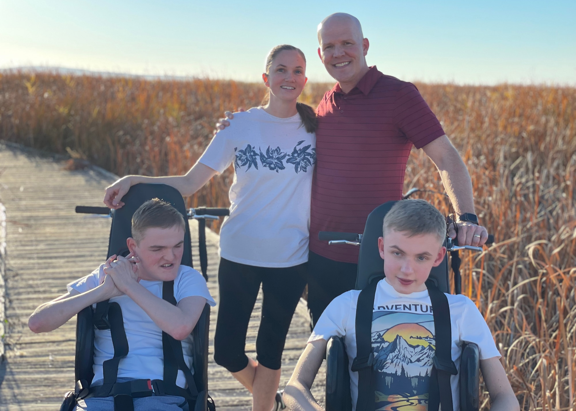 (Center) Master Sgt. Jared Graham, 75th Logistics Readiness Squadron, and wife Laura pose with sons Dino and Tyson, while hiking in their new all-terrain wheelchairs. The Grahams’ received a special needs grant offered by the Air Force Aid Society to purchase the “adventurous wheels” for their sons, enabling them to enjoy the outdoors more. (Courtesy photo)