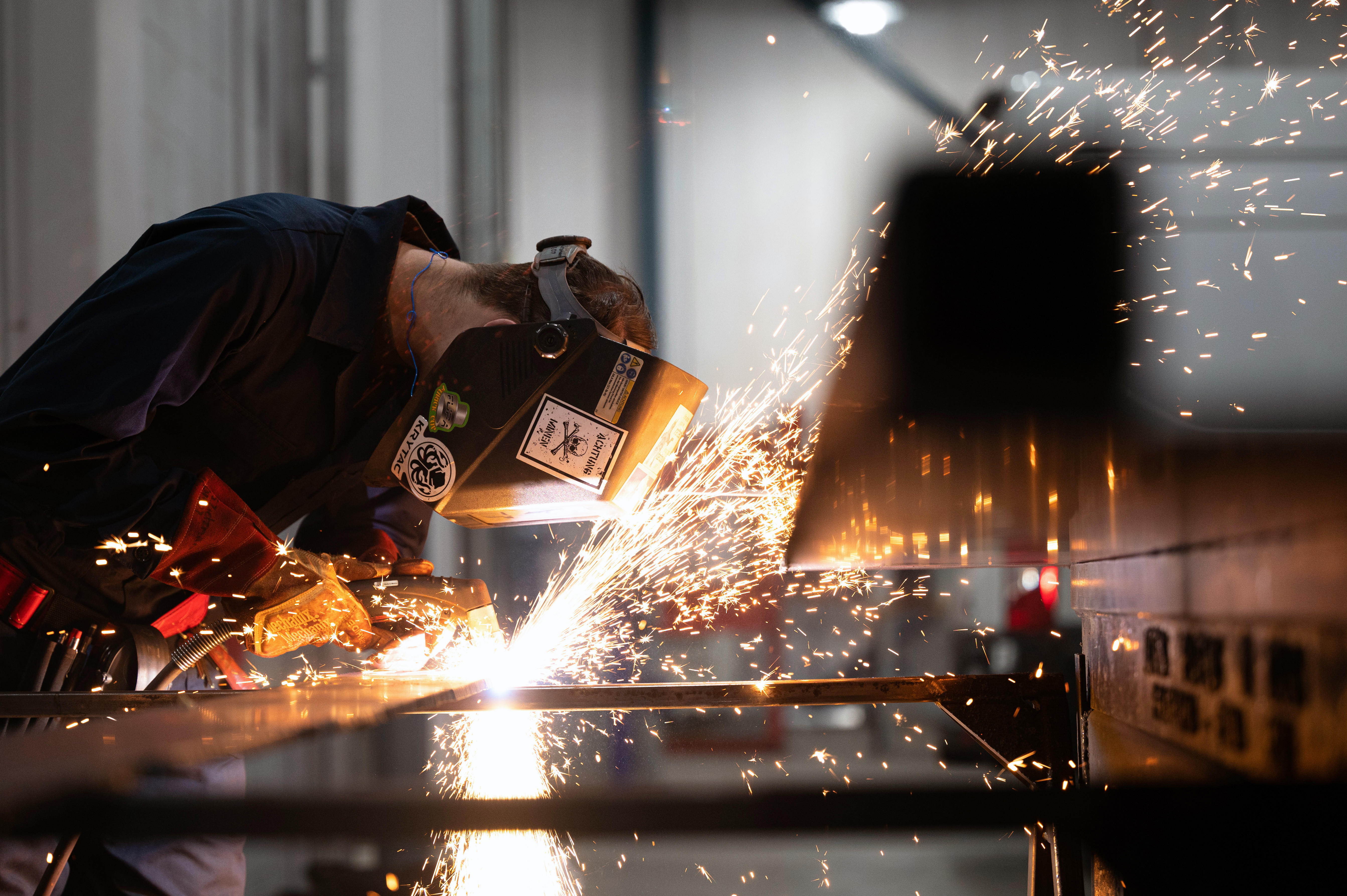 Senior Airman Samuel Zietzmann, a 354th Maintenance Squadron aircraft metals technology journeyman, uses plasma cutting