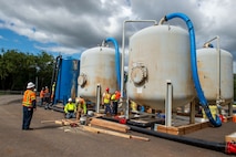 Navy Facilities Engineering Systems Command contractors prepare granular activated carbon filter systems for the Red Hill Well recovery.