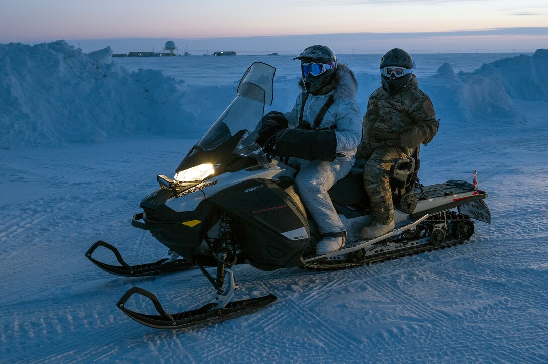 Chief Master Sergeant of the Air Force JoAnne S. Bass prepares for a snowmobile ride
