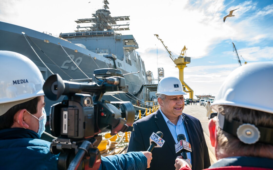 Secretary of the Navy Carlos Del Toro participates in a media interview during a shipyard tour at Ingalls Shipbuilding in Pascagoula, Miss., Jan. 26, 2022. Del Toro is in Mississippi and Alabama to tour shipbuilding facilities, learn more about their capabilities, and discuss ways civilian industry can help strengthen the Navy’s maritime dominance.