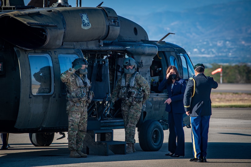 Vice President of the United States Kamala Harris salutes before boarding a UH-60 Blackhawk helicopter at Soto Cano Air Base, Honduras, Jan. 27, 2022.