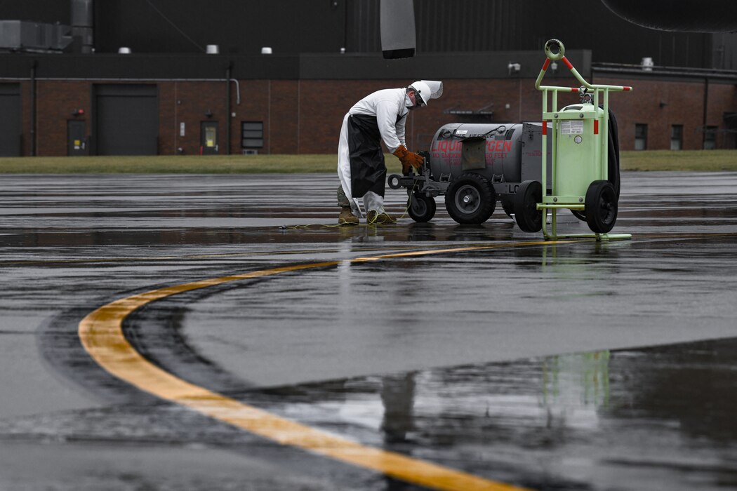 Master Sgt. Robert Comstock, a crew chief with the 910th Aircraft Maintenance Squadron, transports a liquid oxygen cart on Jan. 9, 2022, on the flightline at Youngstown Air Reserve Station.