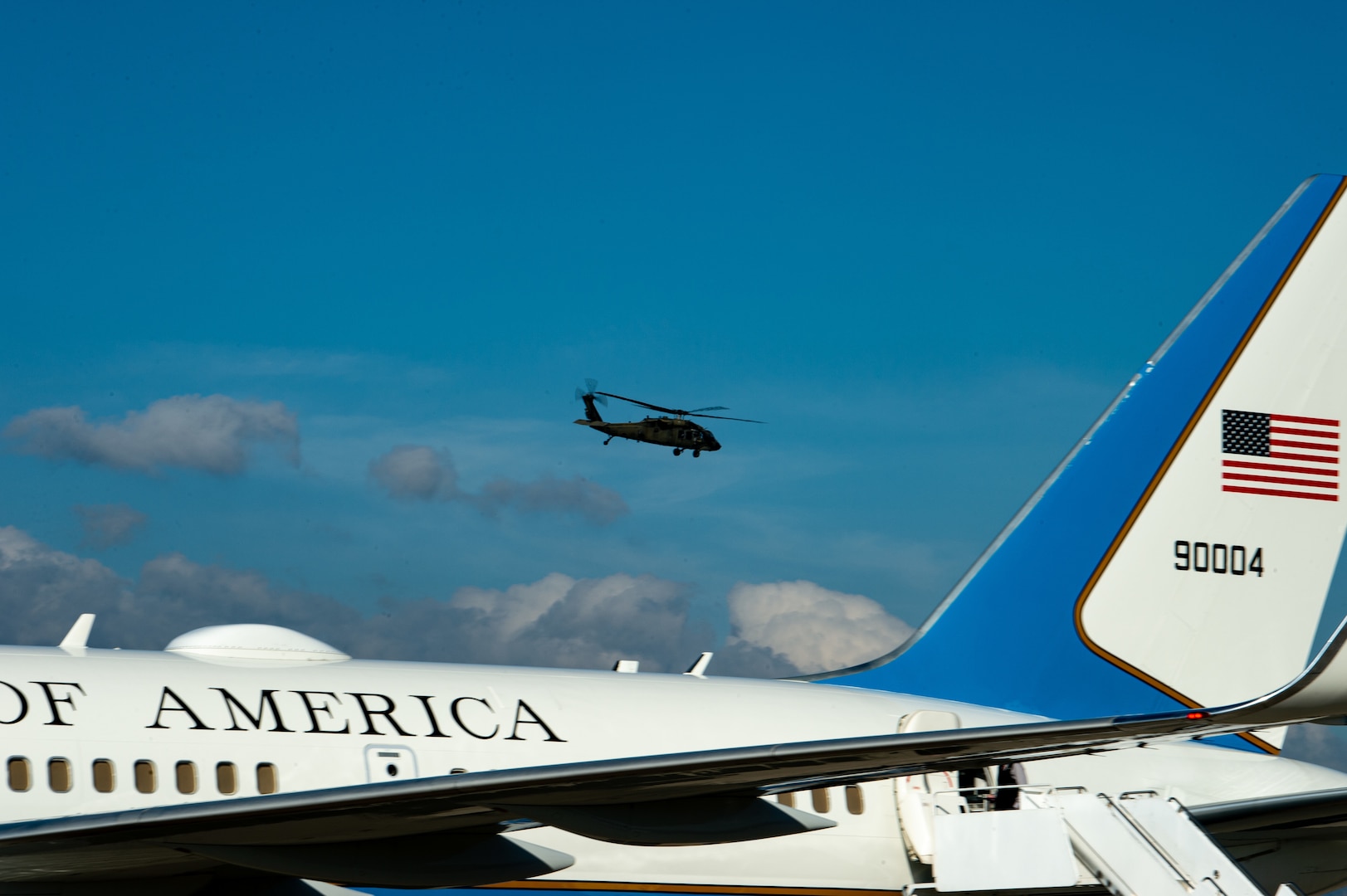 A UH-60 Blackhawk helicopter assigned to Joint Task Force Bravo’s 1st Battalion, 228th Aviation Regiment flies over Air Force Two while transporting Vice President of the United States Kamala Harris at Soto Cano Air Base, Honduras, Jan. 27, 2022.