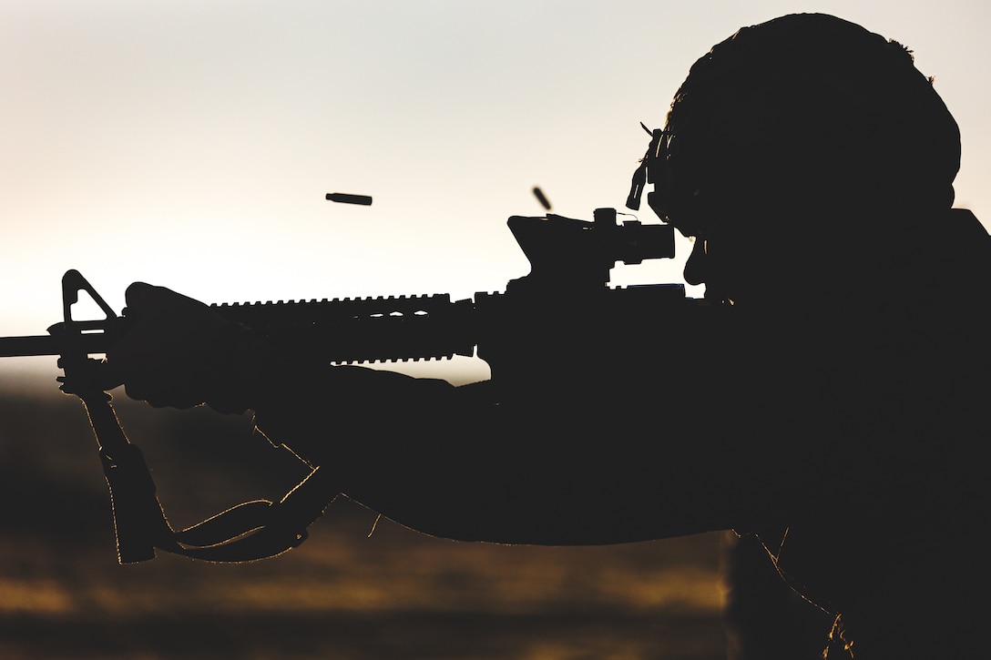 A U.S. Marine competes during the Depot Competition-In-Arms Program at Edson Range, Camp Pendleton, Calif. on Jan. 20, 2022. The DCIAP is a 5-day intramural shooting competition that serves as the initial stage of identifying Marines with the skills and desire to be part of the Marine Corps Recruit Depot San Diego Shooting Team.
