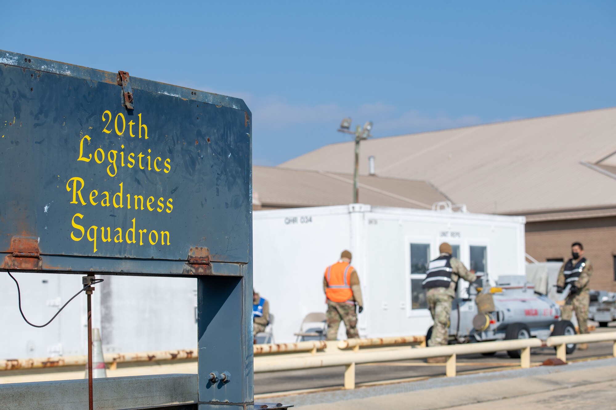 Photo of logistics readiness squadron sign.