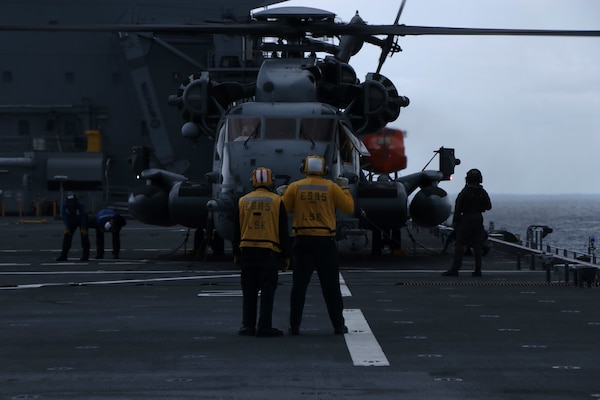 PHILIPPINE SEA (Jan. 28, 2022) A CH-53E Super Stallion helicopter from the 31st Marine Expeditionary Unit (MEU) refuels on the flight deck of USS Miguel Keith (ESB 5). Miguel Keith, assigned to Expeditionary Strike Group 7, is currently operating as the Theater Littoral Warfare Commander's flagship in the U.S. 7th Fleet area of responsibility to enhance interoperability with allies and partners and serve as a ready response force to defend peace and stability in the Indo-Pacific region.