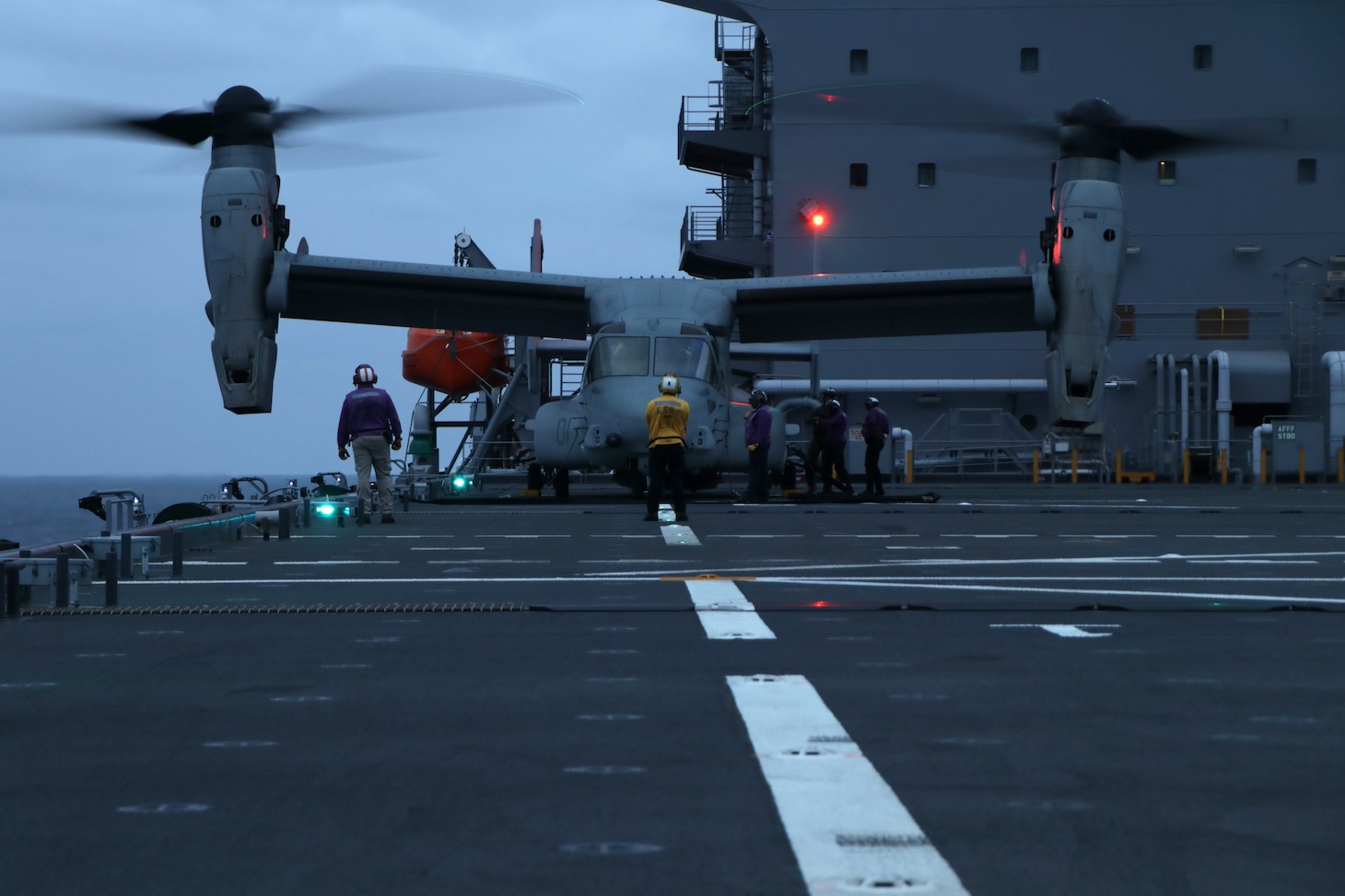 PHILIPPINE SEA (Jan. 28, 2022) An MV-22B Osprey tiltrotor aircraft from the 31st Marine Expeditionary Unit (MEU) refuels on the flight deck of USS Miguel Keith (ESB 5). Miguel Keith, assigned to Expeditionary Strike Group 7, is currently operating as the Theater Littoral Warfare Commander's flagship in the U.S. 7th Fleet area of responsibility to enhance interoperability with allies and partners and serve as a ready response force to defend peace and stability in the Indo-Pacific region.
