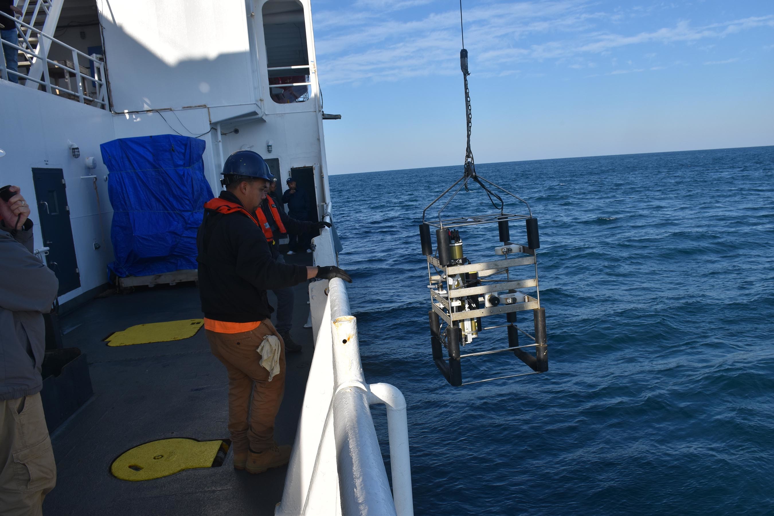 Sailors from U.S. Naval Meteorology and Oceanography Command and staff from Naval Oceanographic Office cast a Conductivity, Temperature, and Depth (CTD) instrument from the Military Sealift Command oceanographic survey ship USNS Pathfinder (T-AGS 60) to measure the conductivity, temperature, and pressure of seawater.