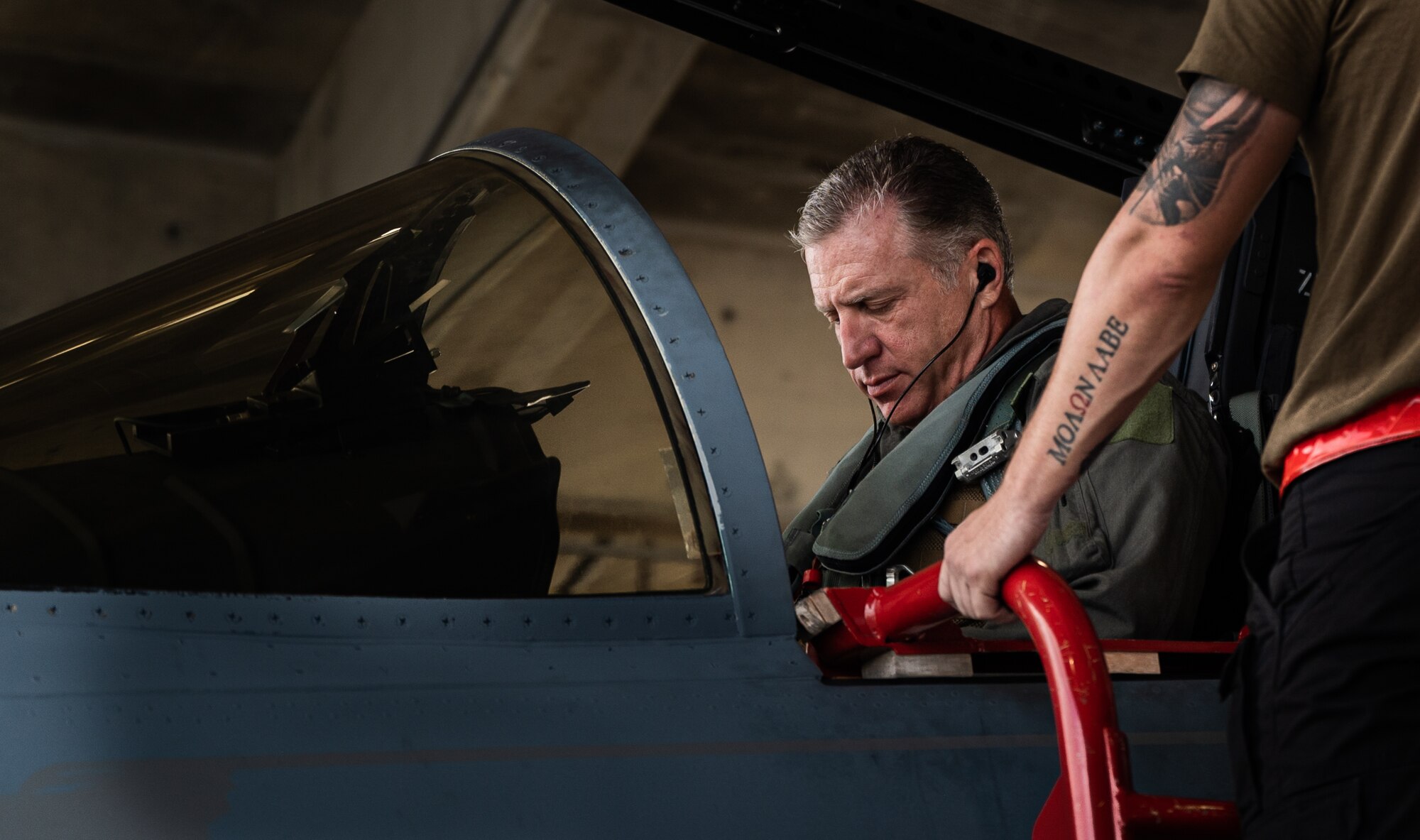 Airman conducts preflight checks.