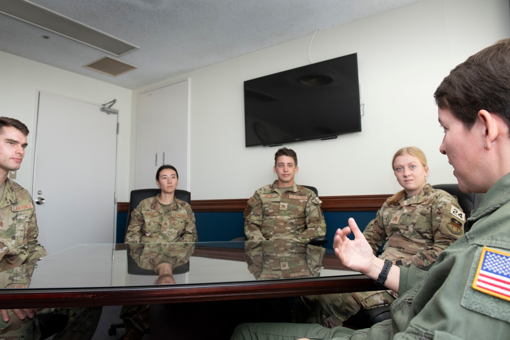 Col. Julie Gaulin, 374th Airlift Wing vice commander, speaks with U.S. Air Force Academy cadets at Yokota Air Base, Japan, June 27, 2022.