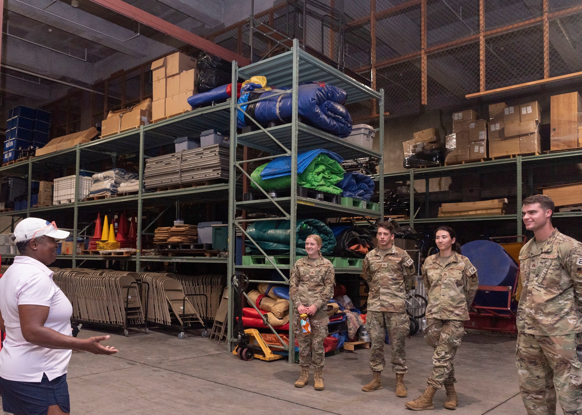 Sherita Baker, 374th Force Support Squadron recreation specialist shows United States Air Force Academy cadets a storehouse of Outdoor Recreation and gives a brief explanation on how  374th FSS community services flight provide Yokota Air Base community members support and services, contributing to mission readiness, resiliency, and well-being of the Yokota AB community