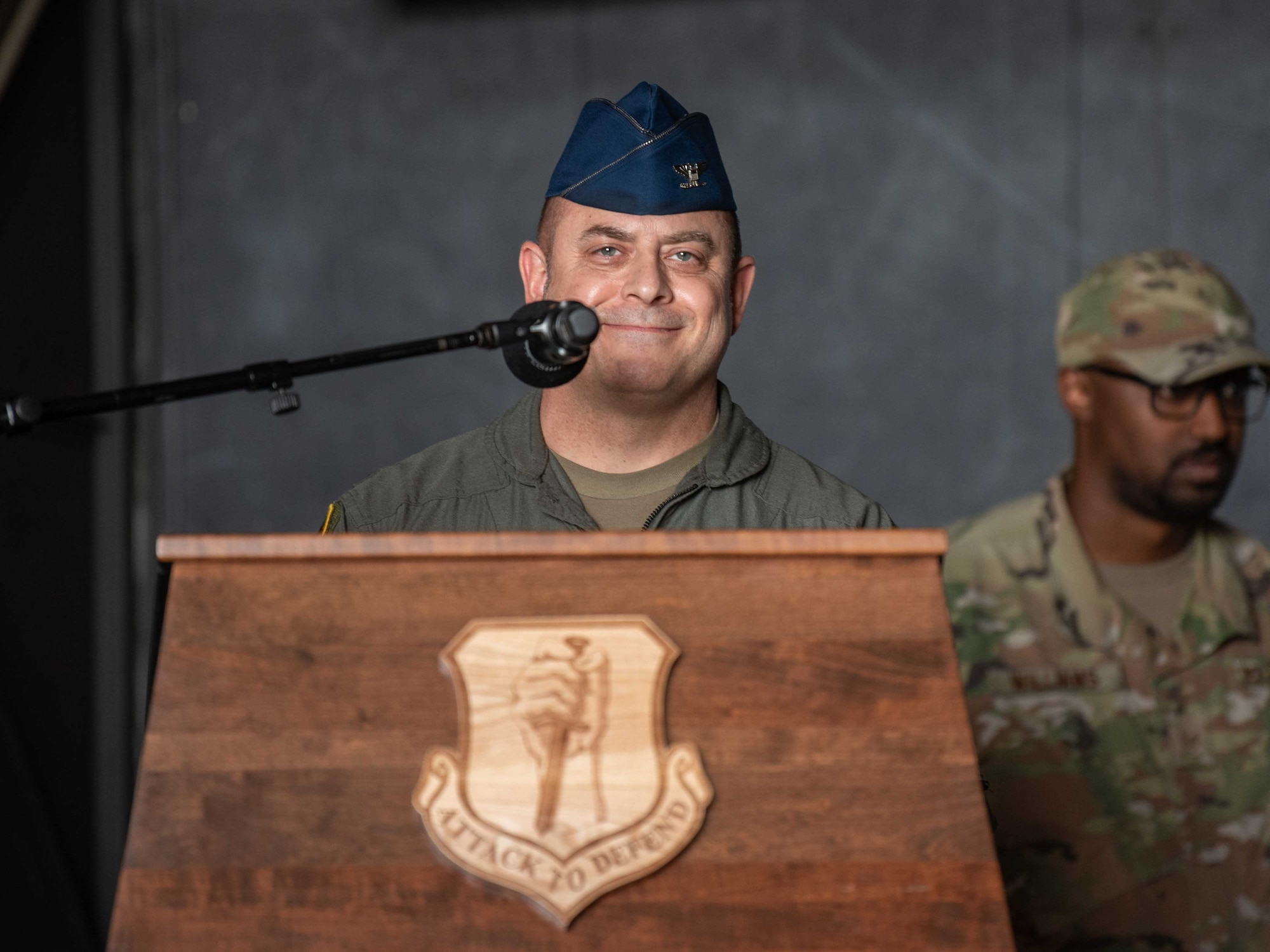 United States Air Force Col. Jesse J. Friedel, 35th Fighter Wing (FW) outgoing commander, smiles as he delivers a speech during the 35th FW change of command ceremony at Misawa Air Base, Japan, June 30, 2022.