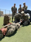 Airmen with the 137th Special Operations Medical Group, Oklahoma Air National Guard, observe Azerbaijan Operational Capabilities Concept Battalion medical personnel treat a simulated combat casualty during a State Partnership Program visit to Baku, Azerbaijan, June 20-24, 2022.