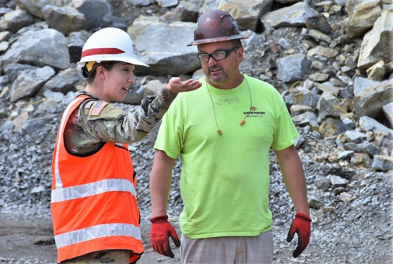 First Lieutenant Anne Schreiner walks the Cyber and Engineering Academic Center (CEAC) construction site at the U.S. Military Academy at West Point.