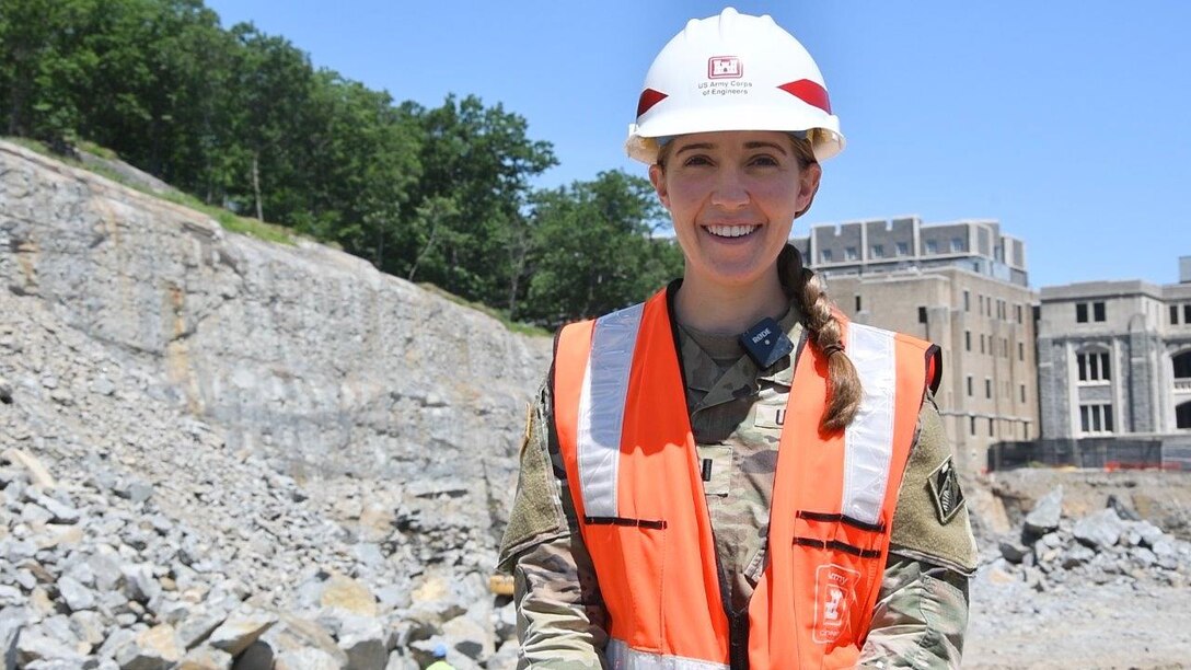 First Lieutenant Anne Schreiner walks the Cyber and Engineering Academic Center (CEAC) construction site at the U.S. Military Academy at West Point.