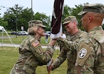 Commanding General of Regional Health Command – Atlantic Brig. Gen. Mary Krueger passes the unit colors to Col. James C. Maker, incoming Fort Meade Medical Department Activity commander, during a change of command ceremony held at the Main Entrance of Kimbrough Ambulatory Care Center, June 21, 2022.