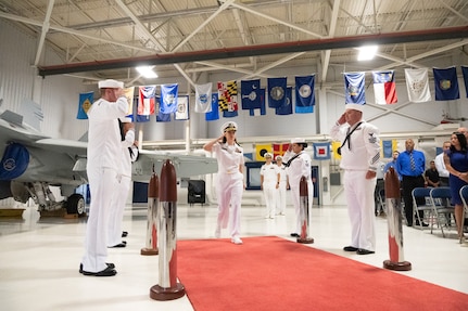 IMAGE: Cmdr. Christina Carino arrives for the change of command ceremony June 29, at Naval Air Station Oceana in Virginia Beach. Carino assumed command of Naval Surface Warfare Center Dahlgren Division Dam Neck Activity after relieving Cmdr. Matthew Erdner.