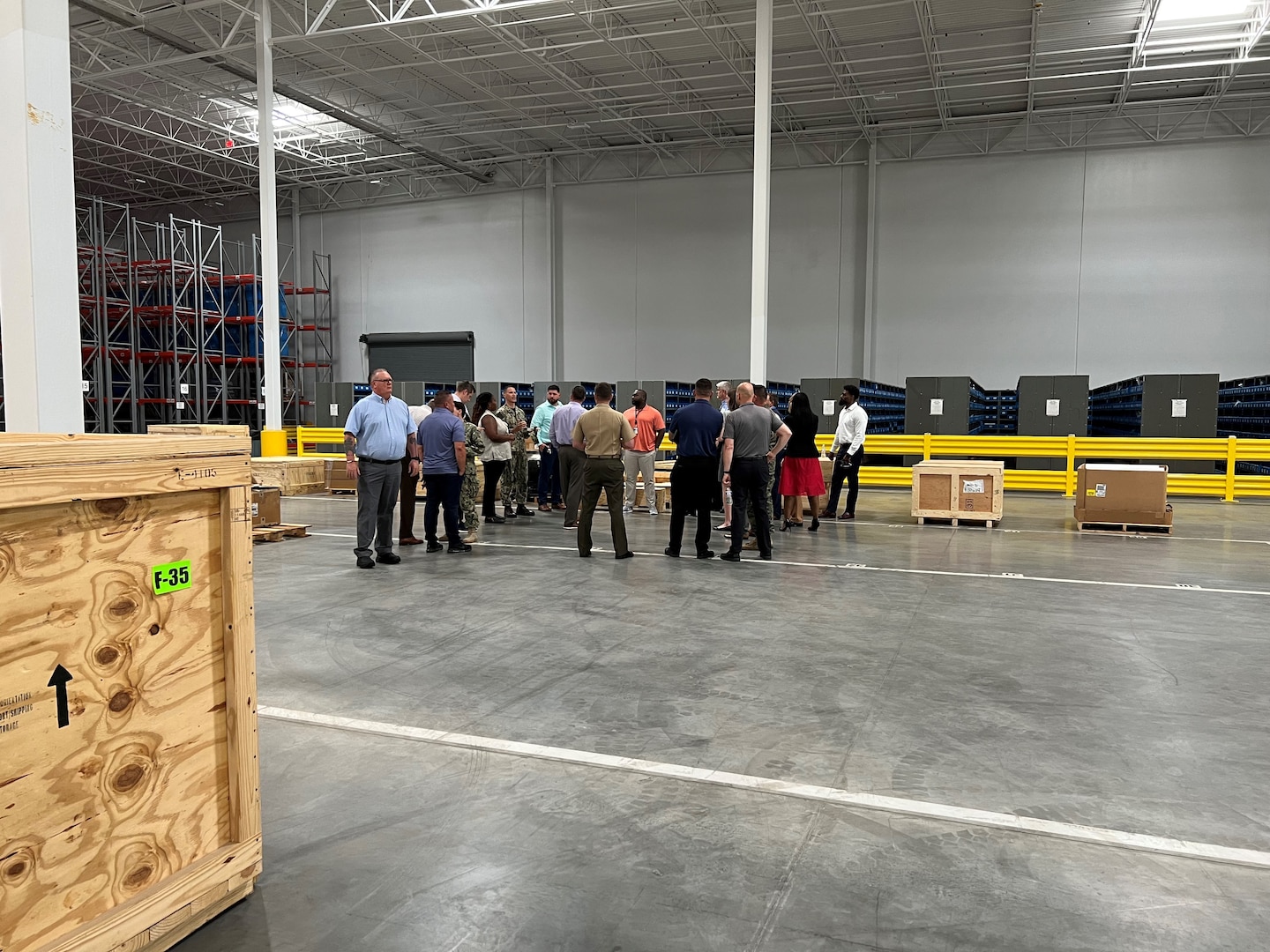 People gathered in a warehouse.