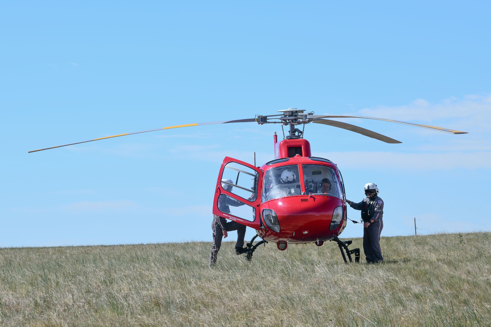 The UCHealth LifeLine medivac helps the 90th Missile Wing (90 MW) by medevacking the simulated injured people during the 2022 major accident response exercise, June 29, 2022, on F.E. Warren Air Force Base, Wyoming. Partnerships with community first responders helps the base improve emergency medical response during exercises and real-world events. (U.S. Air Force photo by Airman 1st Class Sarah Post)