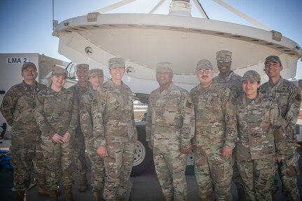 Senior Enlisted Advisor Tony Whitehead, center right, the SEA to the chief of the National Guard Bureau, stands with Command Chief Master Sgt. Lisa Perry, the Colorado National Guard’s command senior enlisted leader, and members of the Colorado Guard’s 138th Space Control Squadron on Schriever Space Force Base, Colorado, June 28, 2022. Whitehead visited Colorado Guard space and missile defense units in Colorado Springs to see how National Guard members are contributing to these expanding domains.