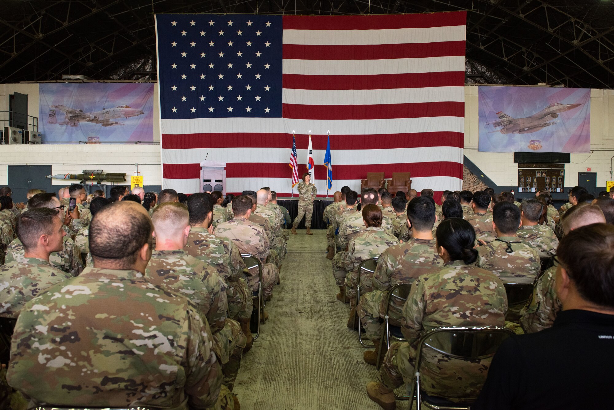 Chief Master Sgt. of the Air Force JoAnne S. Bass speaks during a base all-call at Osan Air Base, Republic of Korea, June 28, 2022.