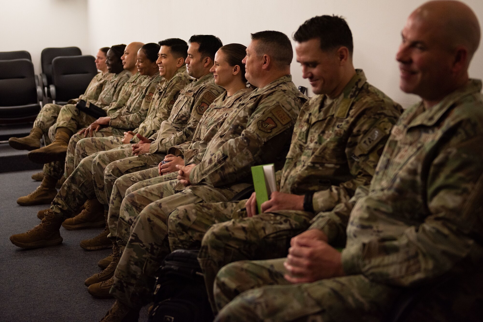 Seventh Air Force senior enlisted leaders listen during an engagement with Chief Master Sgt. of the Air Force JoAnne S. Bass, at Osan Air Base, June 28, 2022.