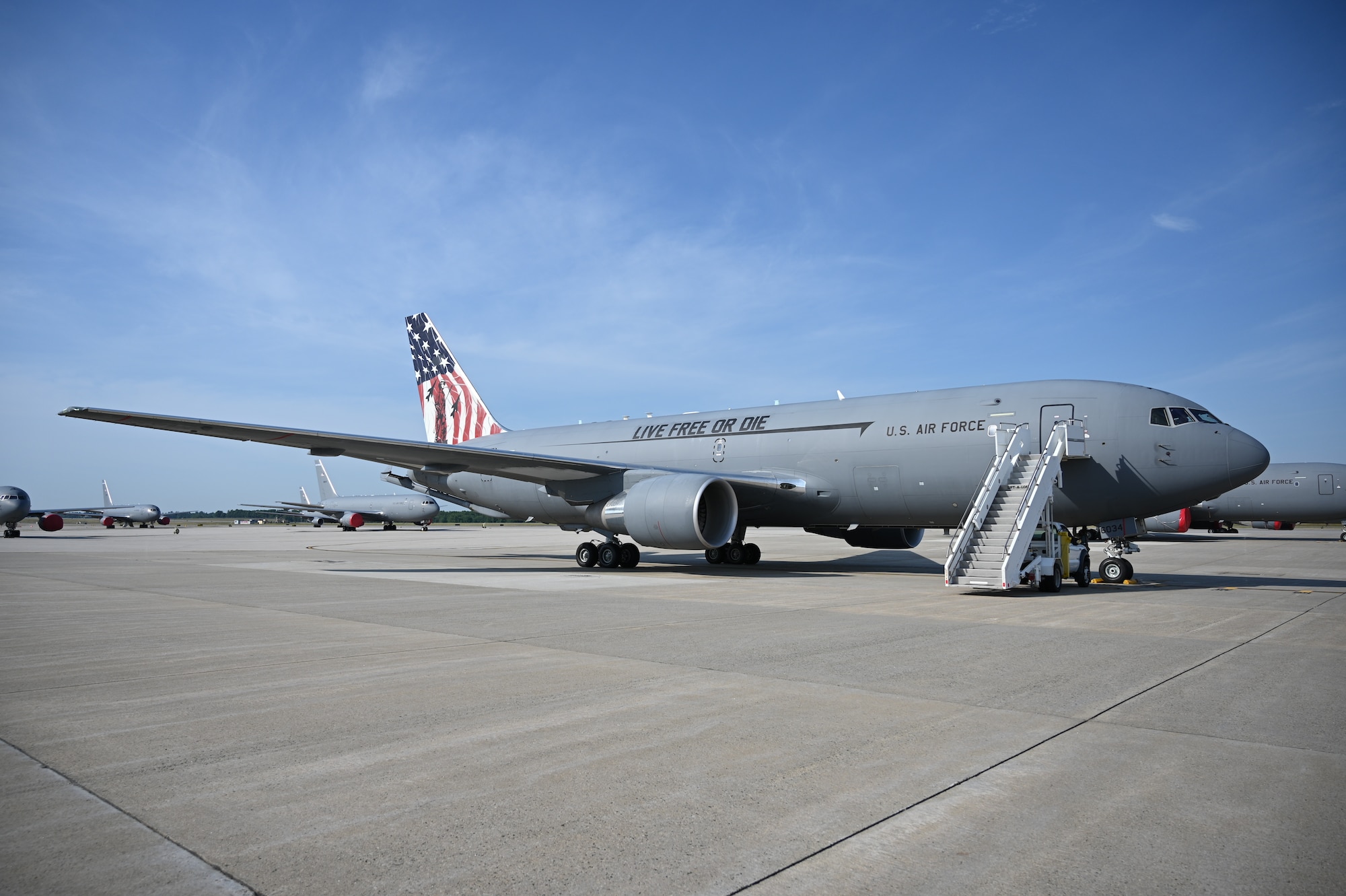 A KC-46A Pegasus, dubbed the Spirit of Portsmouth and emblazoned with a colorful new paint job, touches down at Pease Air National Guard Base New Hampshire, July 1, 2022.