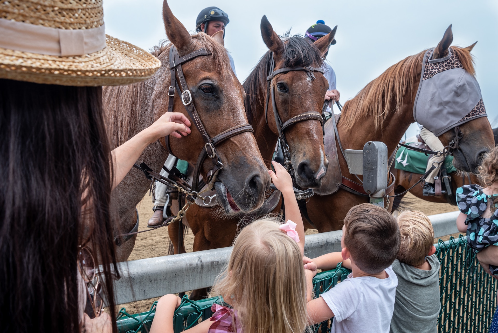 More than 150 Airmen, friends and family members attend Military Appreciation Day at Churchill Downs in Louisville, Ky., June 12, 2022, to honor Tech. Sgt. Travis Brown, a pararescueman from the Kentucky Air National Guard’s 123rd Special Tactics Squadron who died Feb. 16. One of the races on the day's card was named in honor of Brown and concluded with eight of his fellow 123rd STS Airmen presenting the trophy. (U.S. Air National Guard photo by Tech. Sgt. Joshua Horton)
