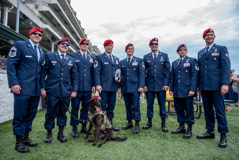 Members from the 17th Special Tactics Squadron, Fort Beinning, GA, teach  civilians how to don special tactics equipment before the Arizona Cardinals  Salute to Service game, Nov. 18, 2018, at the State