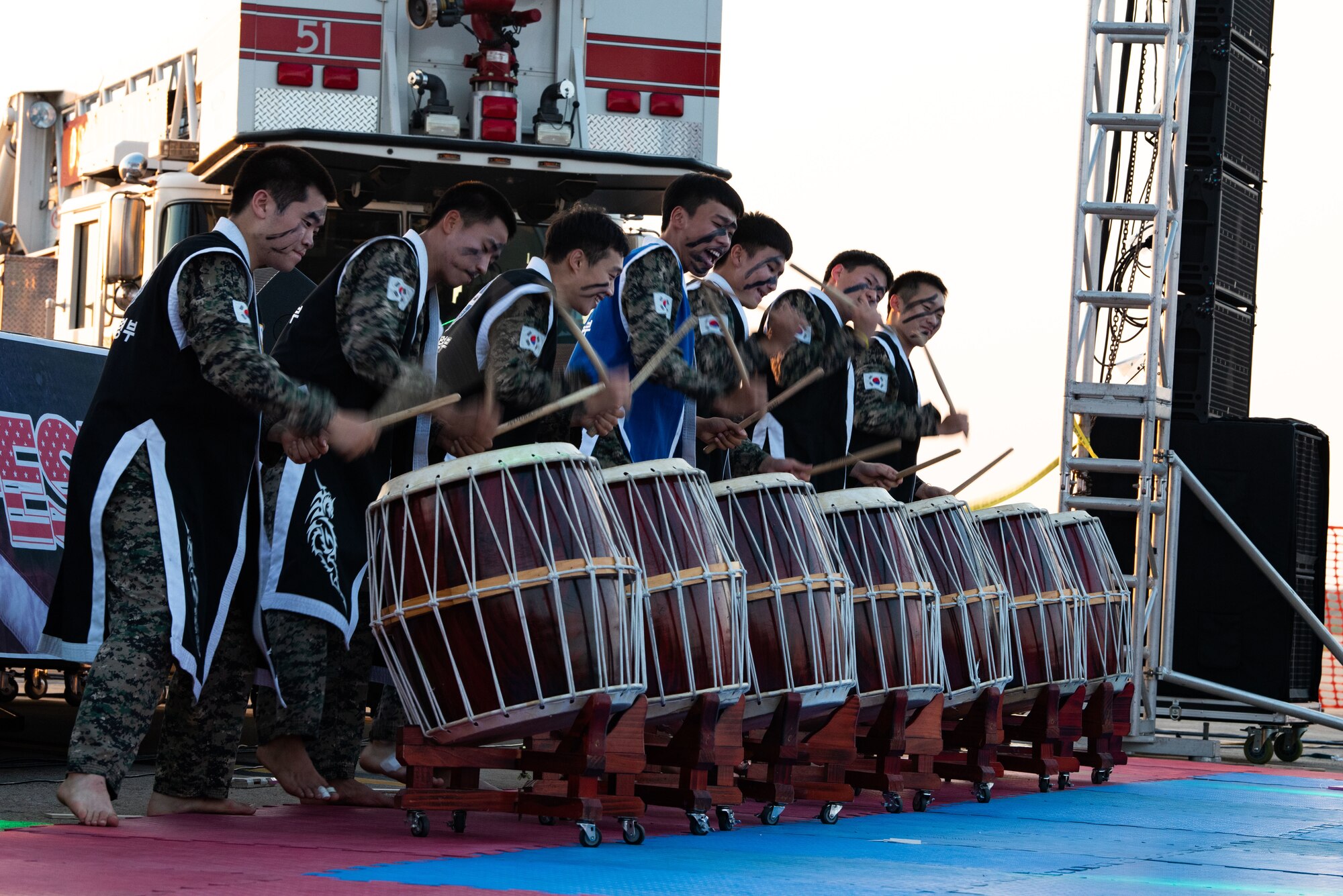 First Republic of Korea Army Corps taekwondo team members, play drums as part of a taekwondo performance during Liberty Fest at Osan Air Base, Republic of Korea, July 2, 2022.