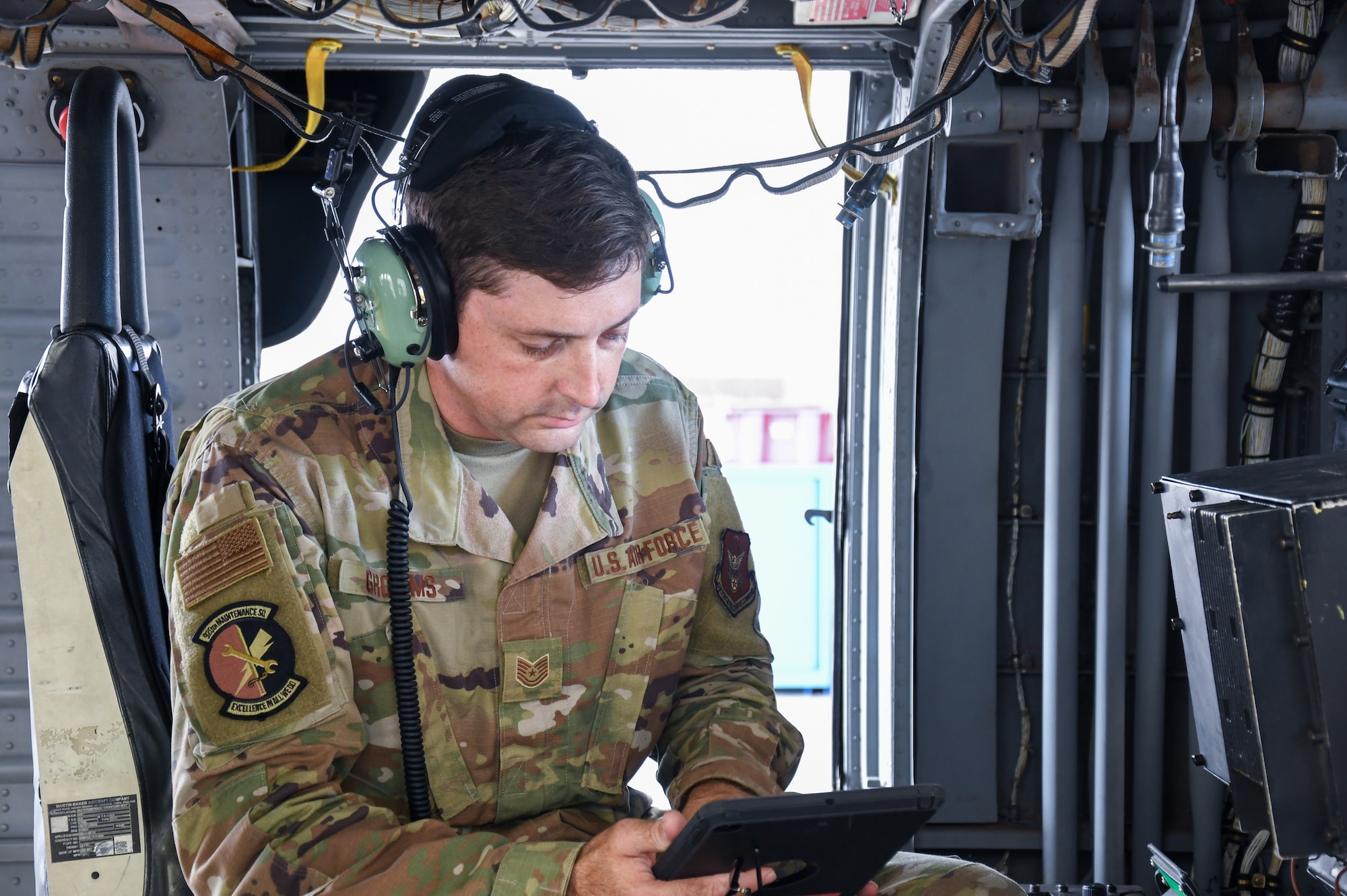 Technical Sgt. Gordon Grooms, 920th Maintenance Squadron maintainer, checks the automated flight control systems on an HH-60G Pave Hawk at Patrick Space Force Base, Florida, June 30, 2022. The 920th MXS preforms phase inspections to ensure the HH-60G Pave Hawks preform safely and effectively. (U.S. Air Force photo by Staff Sgt. Darius Sostre-Miroir)