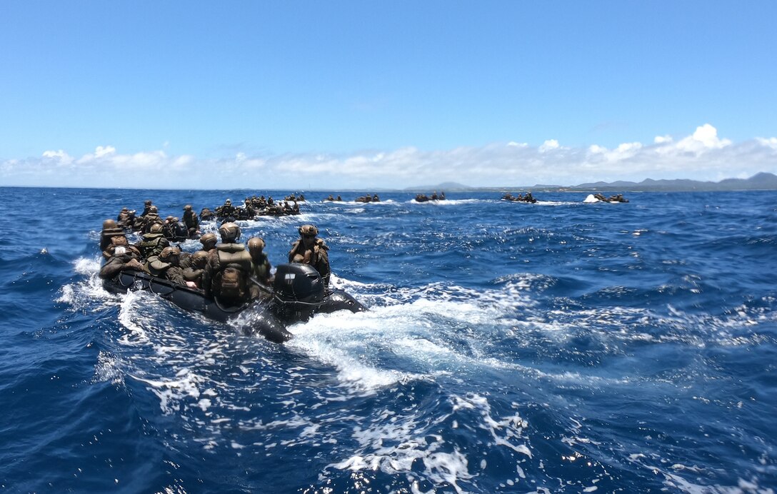 U.S. Marines with Battalion Landing Team 2/5, 31st Marine Expeditionary Unit, execute boat formations during a boat raid training exercise on Kin Blue, Okinawa, Japan, June 29, 2022.

The exercise was conducted to improve communication between the ground combat element and additional supporting units that may assist them in potential rea-world situations fostering a more efficient and cohesive unit.

The 31st MEU, the Marine Corps’ only continuously forward-deployed MEU, provides a flexible and lethal force ready to perform a wide range of military operations as the premiere crisis response force in the Indo-Pacific region.