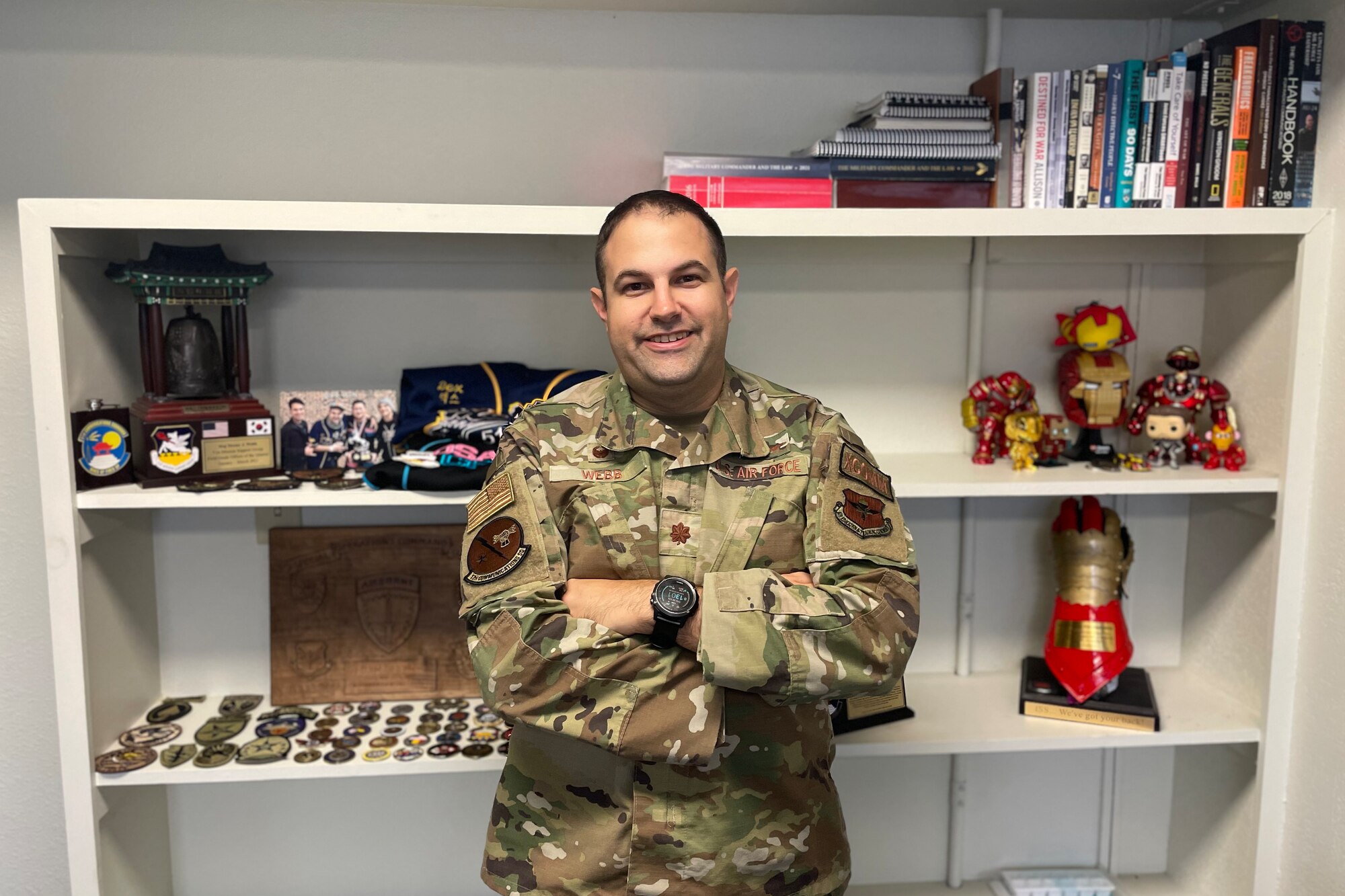 U.S. Air Force Maj. Dexter Webb, 17th Communications Squadron commander, showcases his office display, at Goodfellow Air Force Base, Texas, June 23, 2022. Webb lived more than half his life overseas and has a long military family lineage, dating back to the American Revolution. (U.S. Air Force photo by Senior Airman Abbey Rieves)