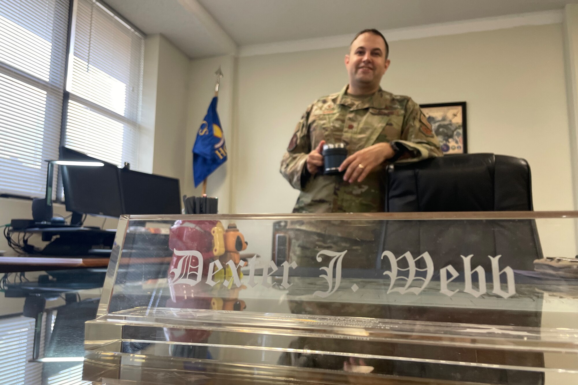 U.S. Air Force Maj. Dexter Webb, 17th Communications Squadron commander, poses for a photo, at Goodfellow Air Force Base, Texas, June 23, 2022.  Previously assigned to the 51st Fighter Wing at Osan Air Base, Republic of Korea, Webb said he is enjoying the slower pace of San Angelo, Texas and Goodfellow, but also has big plans during his command. (U.S. Air Force photo by Senior Airman Abbey Rieves)