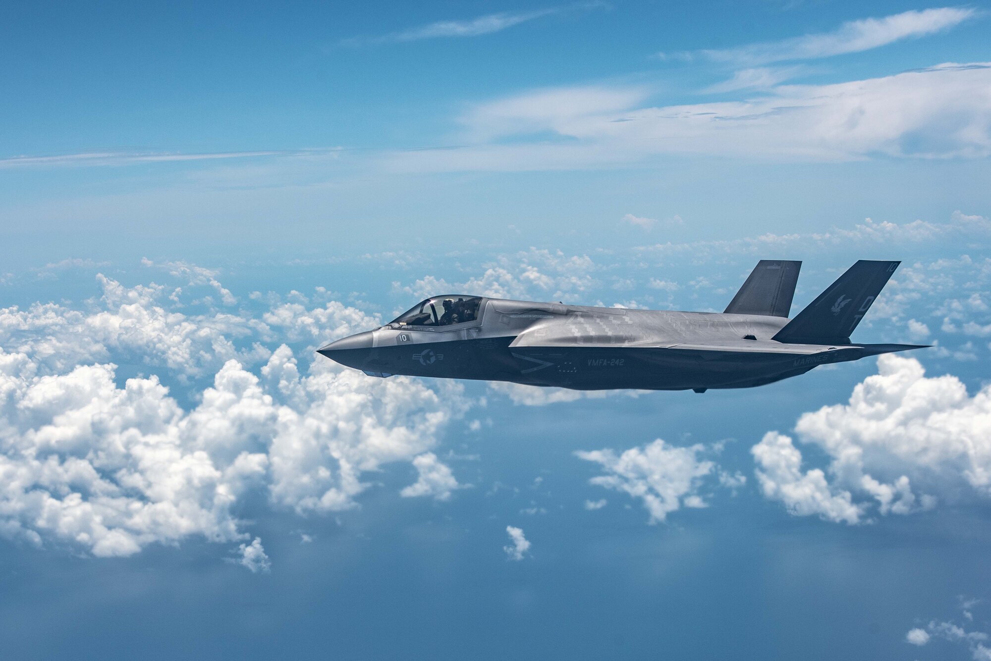 Aircraft flies alongside another aircraft