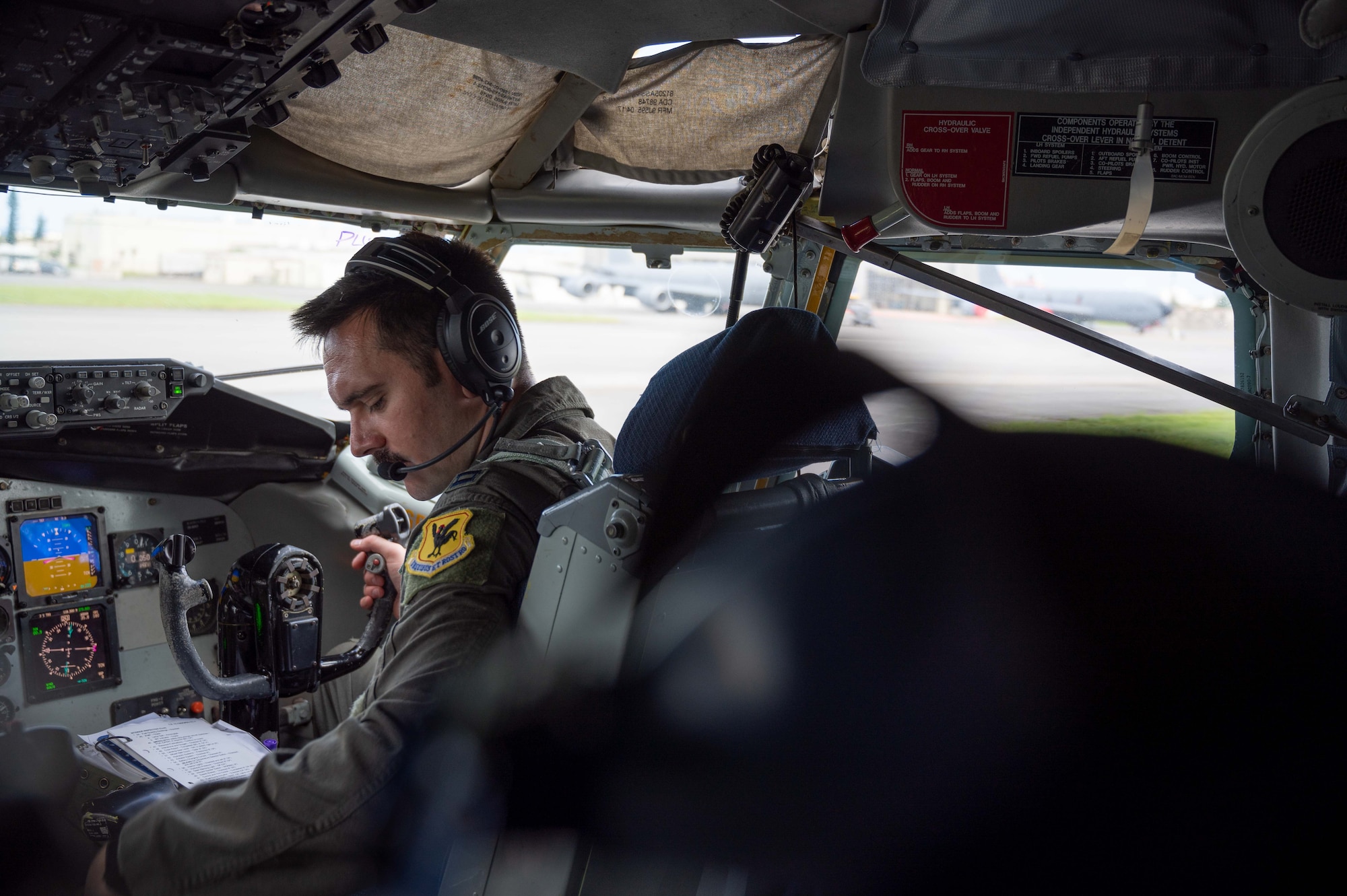 Pilot reads through a check list