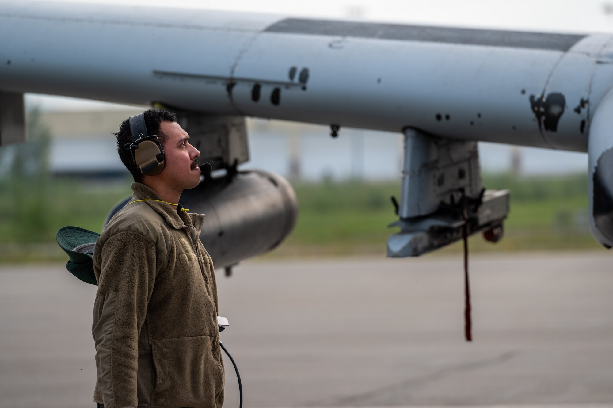 U.S. Air Force Staff Sgt. Manuel Baryon, 25th Fighter Generation Squadron crew chief, assists with A-10 Thunderbolt II engine operational checks prior to flight operations as part of exercise RED FLAG-Alaska 22-2