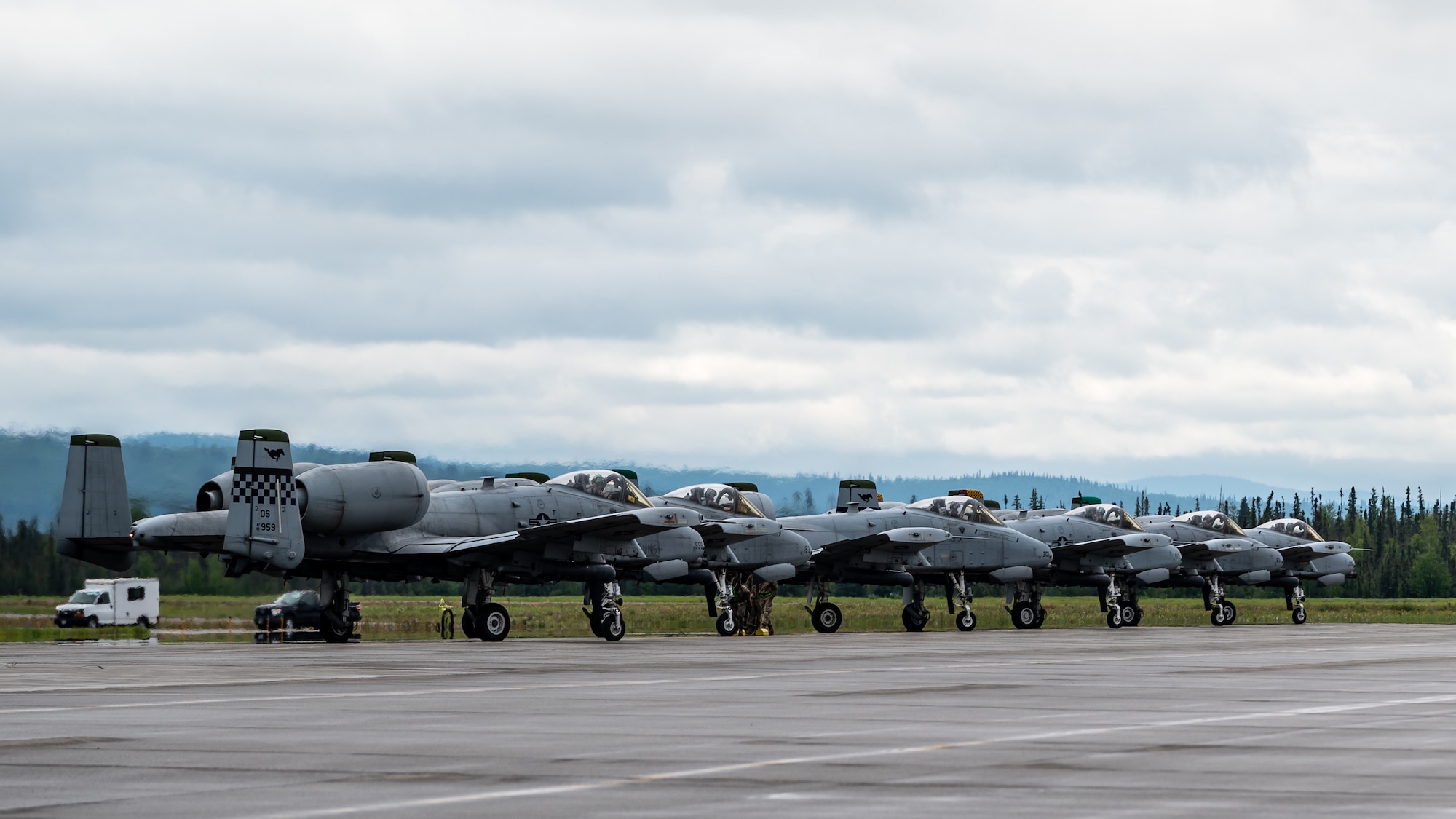 A line of A-10 Thunderbolt IIs assigned to the 25th Fighter Squadron wait for takeoff before performing flight operations in support of exercise RED FLAG-Alaska 22-2