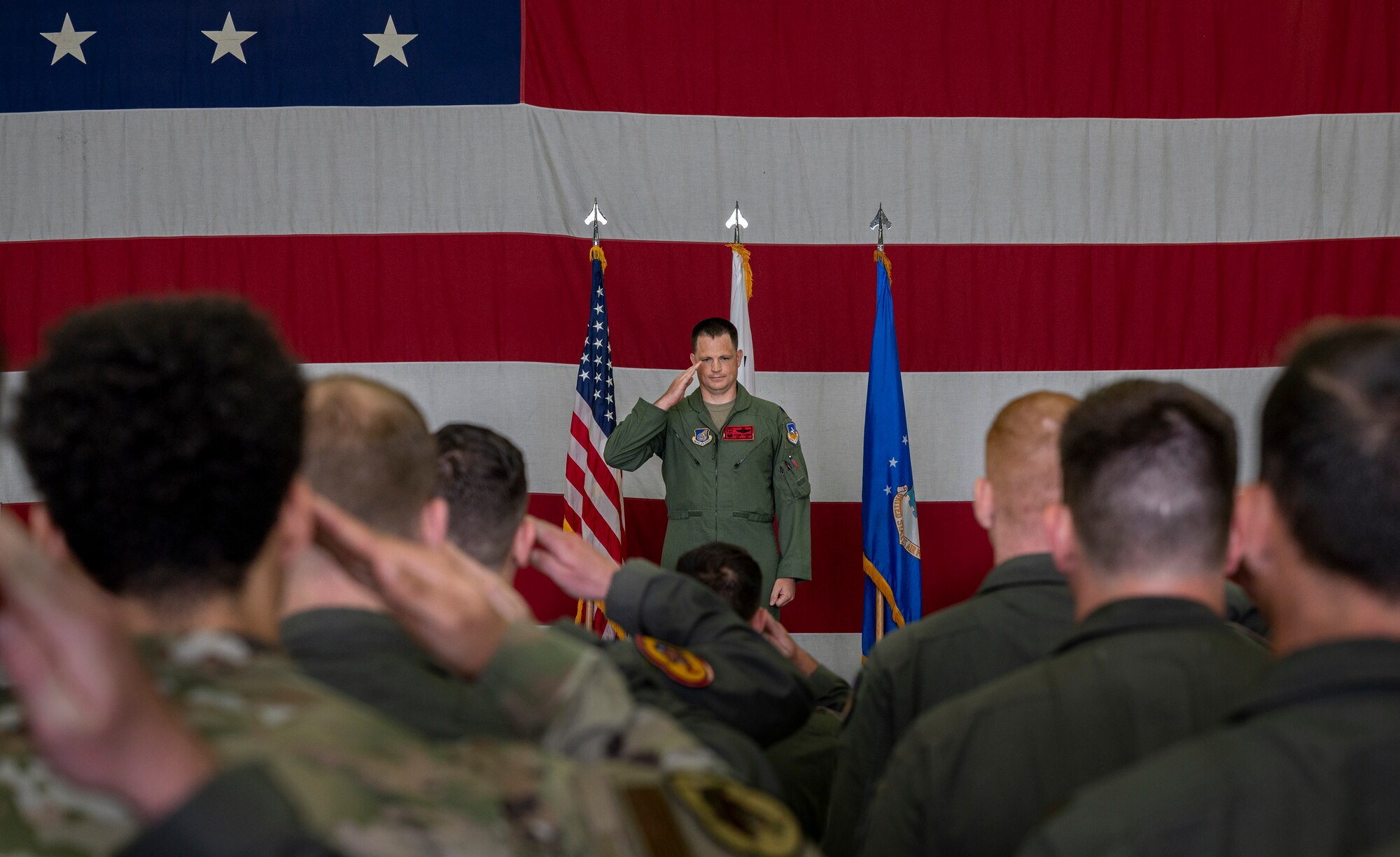 Lt. Col. Cory Farrer, 36th Fighter Squadron newly-appointed commander, renders his first salute as the 36th FS commander to his squadron members at Osan Air Base, Republic of Korea, June 30, 2022.