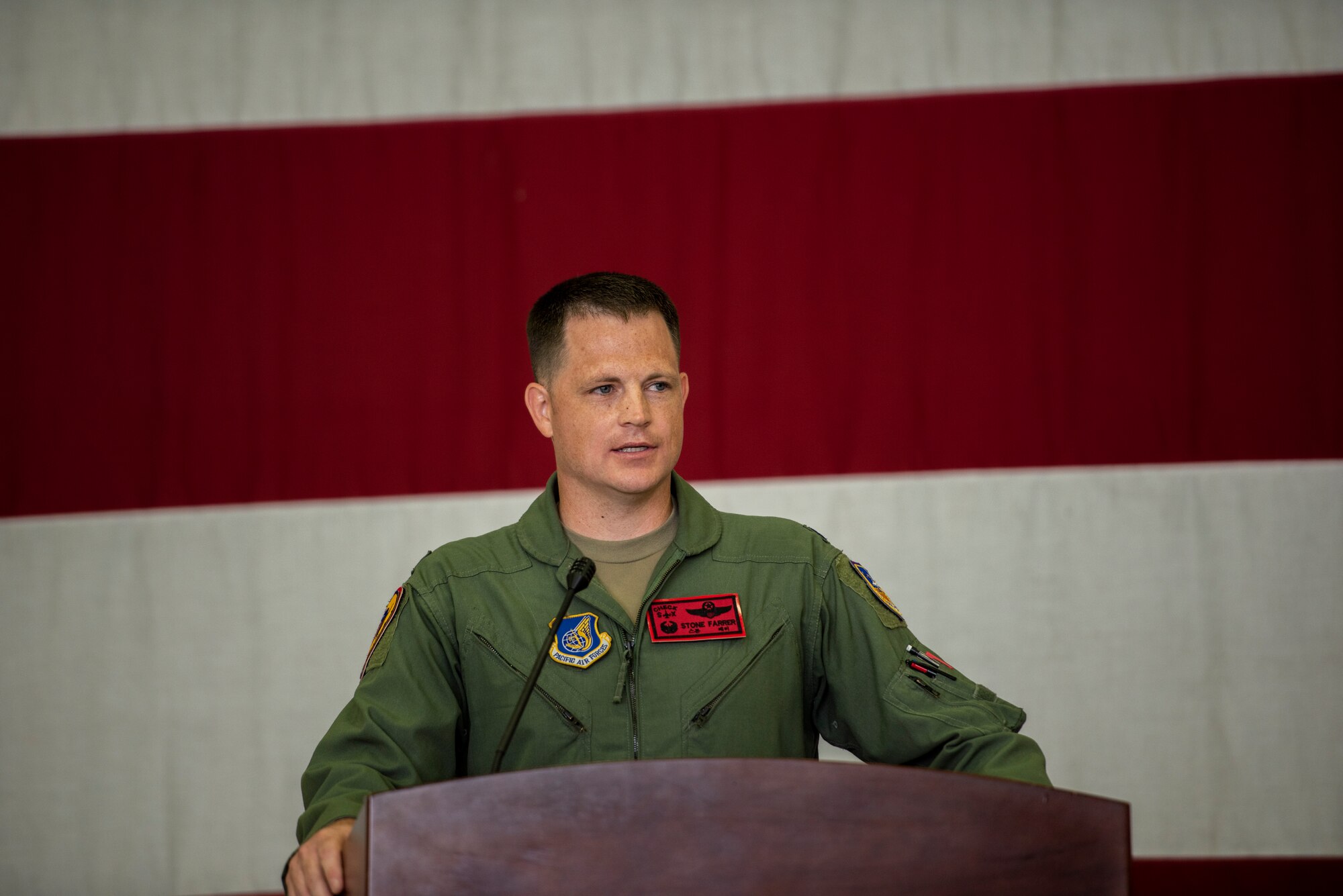 Lt. Col. Cory Farrer, 36th Fighter Squadron newly-appointed commander, addresses the audience after taking command of the FS at Osan Air Base, Republic of Korea, June 30, 2022.